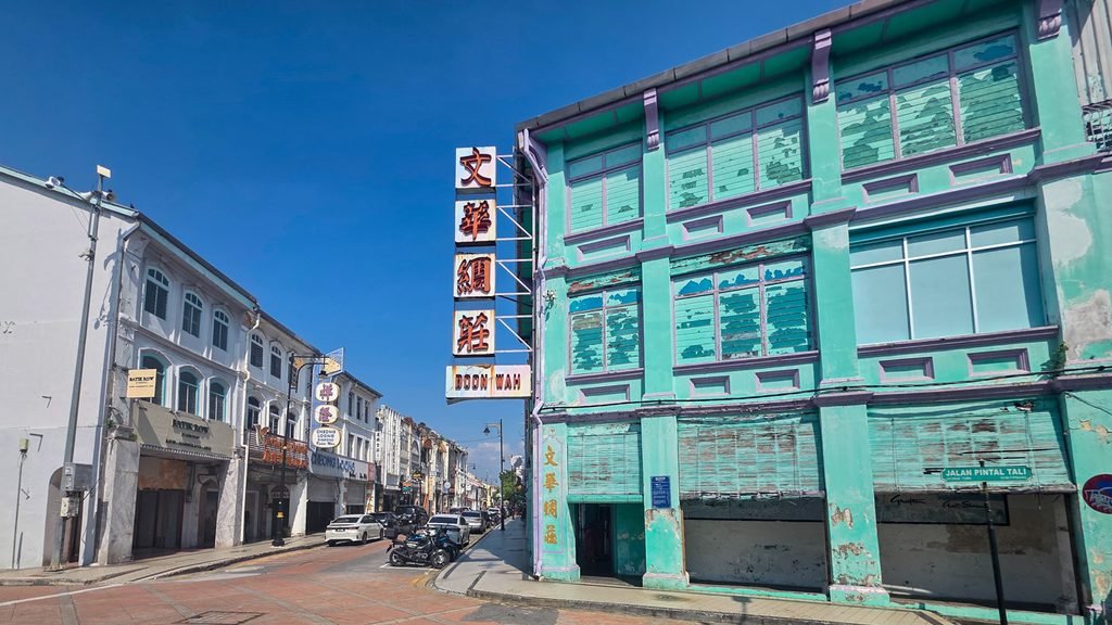 Old building with peeling paint in George Town, Penang