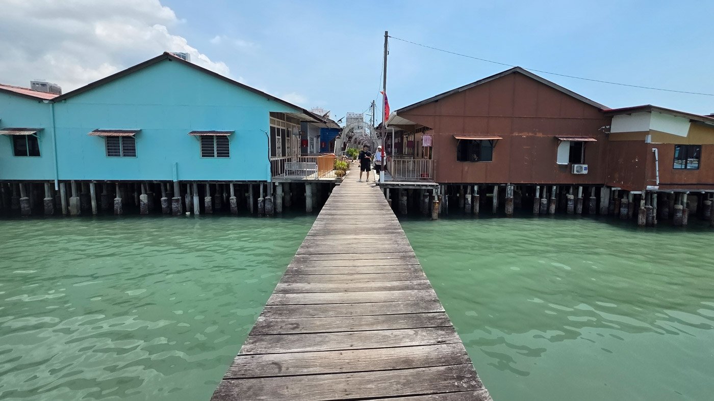 Traditional red and blue houses at Tan Jetty in George Town, Penang
