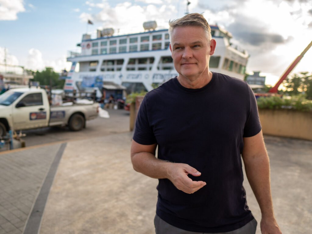 Martin Gram standing near the ferry terminal in Surat Thani, Thailand.