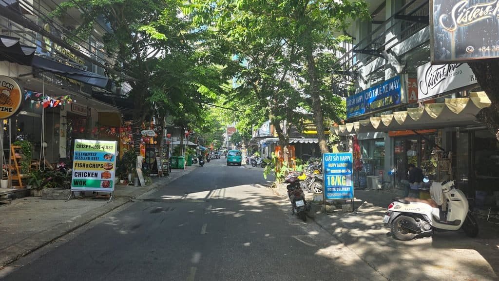 Street in An Thuong, Da Nang with cafés, restaurants, scooters and local businesses