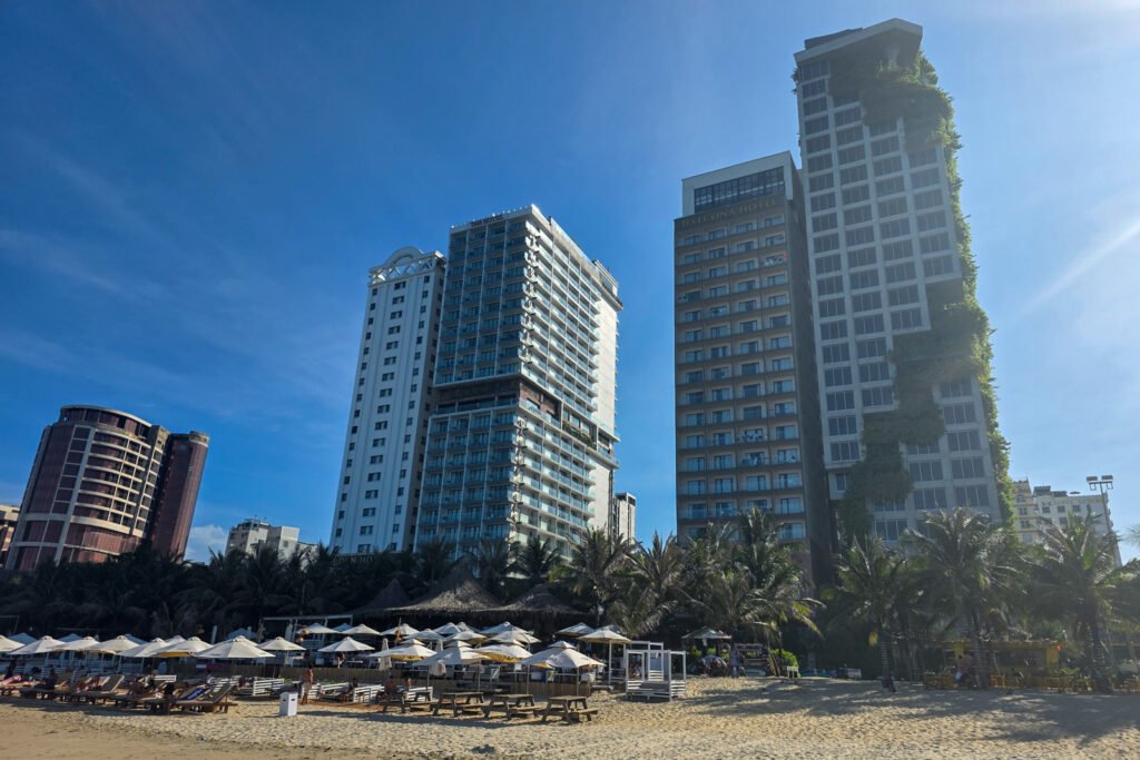 Da Nang beach with high-rise buildings behind the shoreline in Vietnam
